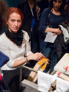 at the leather work station, where we see how a bag handle was painstakingly put together